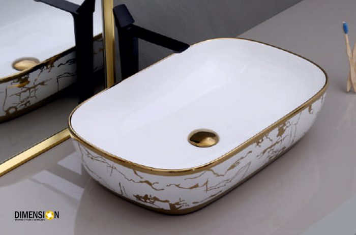 oblong shaped golden and white designer wash basin